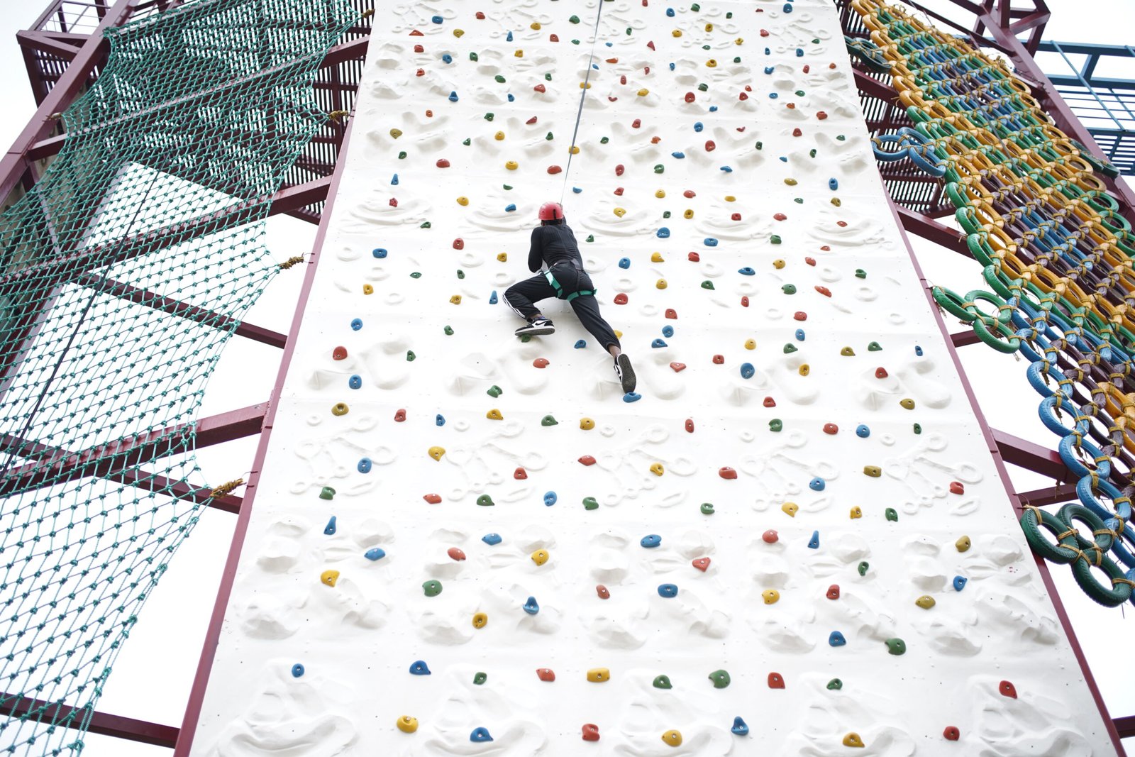 Guest mid-air on the bungee ejection in the Sky High Zone at Elevate