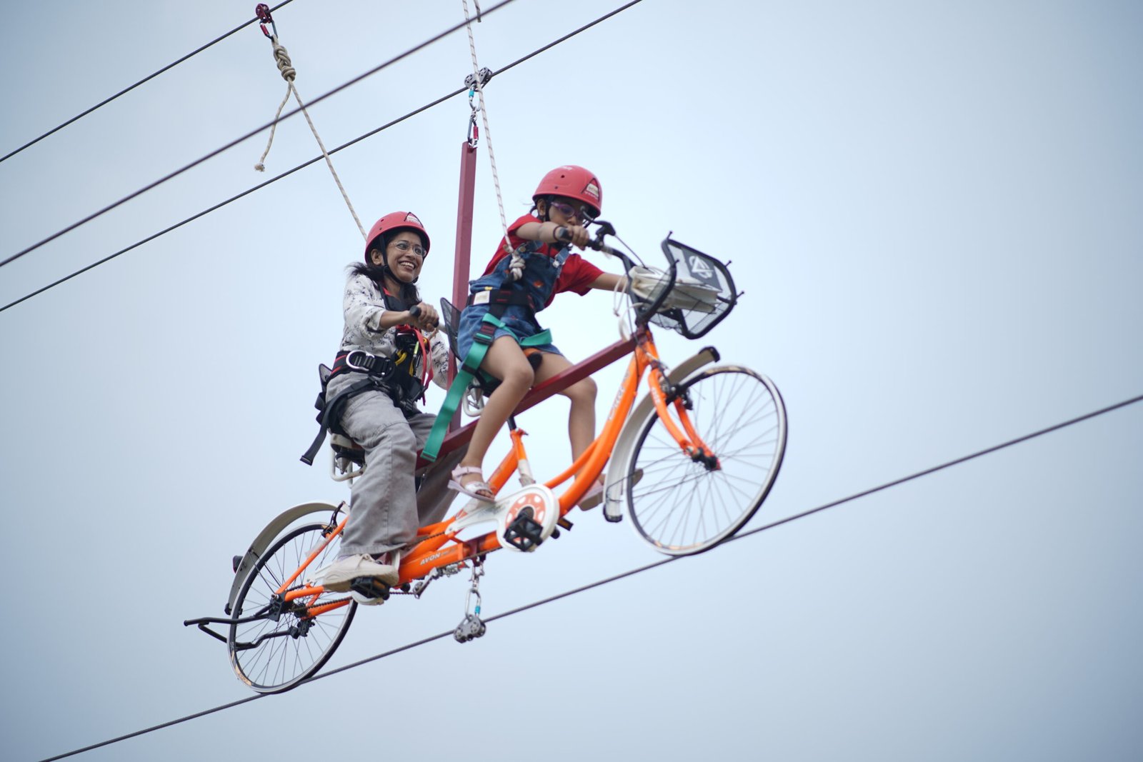 Guest mid-air on the bungee ejection in the Sky High Zone at Elevate