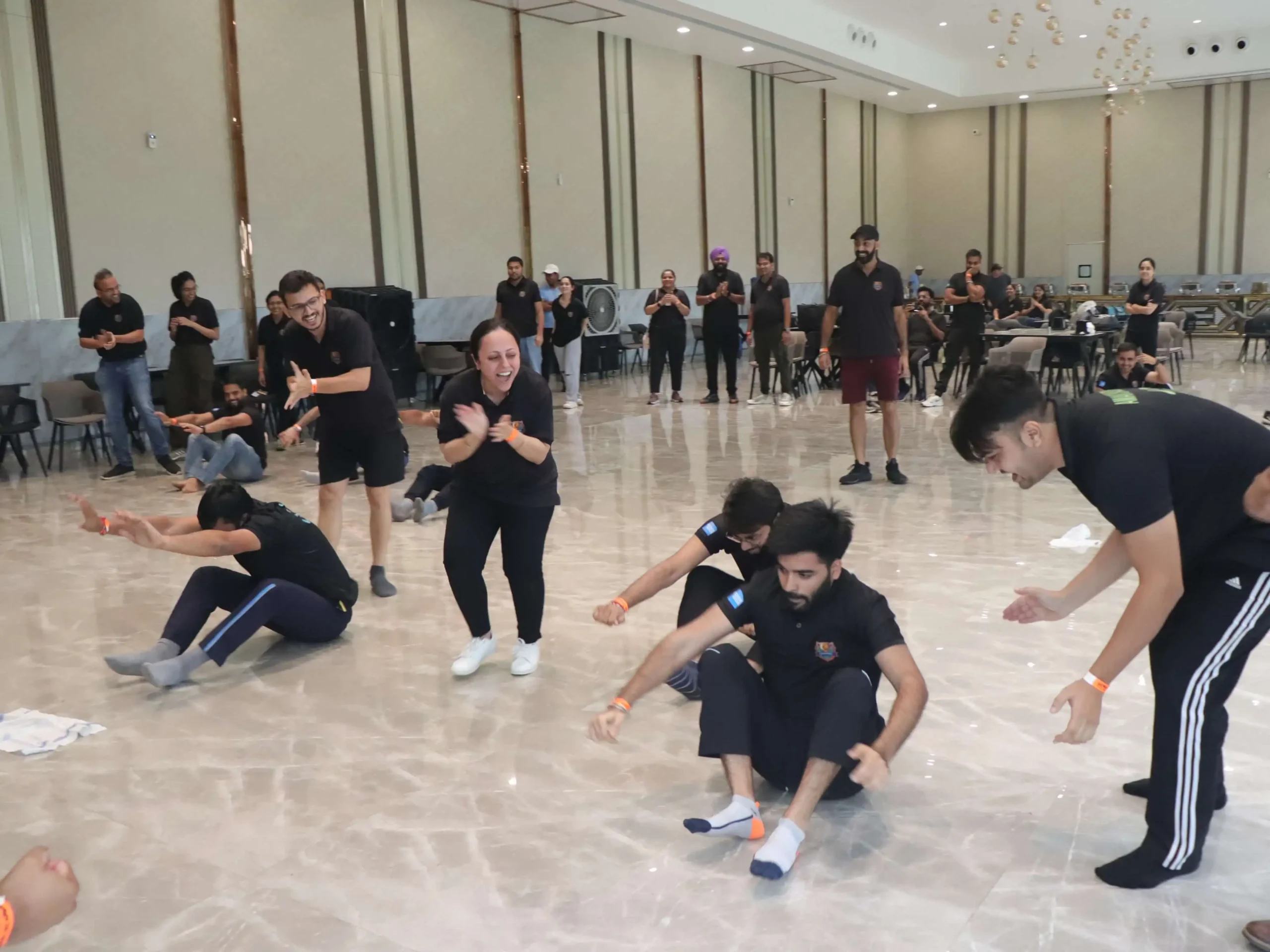Corporate team taking on a group challenge at Elevate