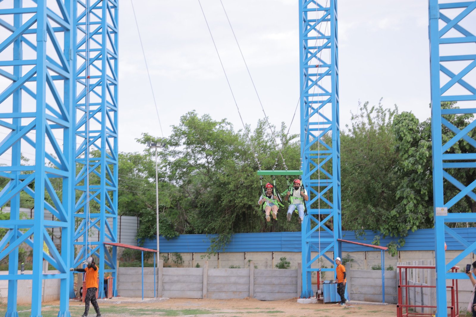 Guest mid-air on the bungee ejection in the Sky High Zone at Elevate